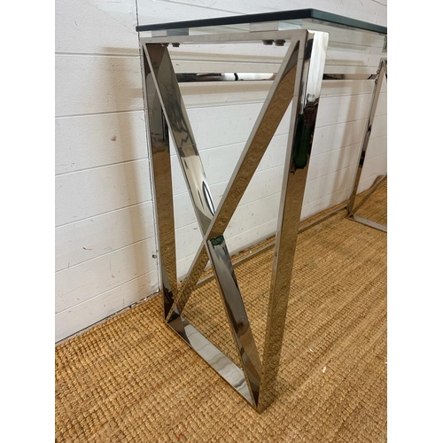 82 - A contemporary chrome based console table with glass top Height 78 40x120