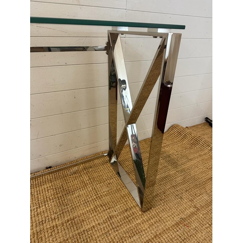 82 - A contemporary chrome based console table with glass top Height 78 40x120