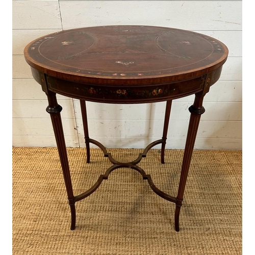 91 - An Edwardian mahogany and painted centre table. Height 75 diameter 69