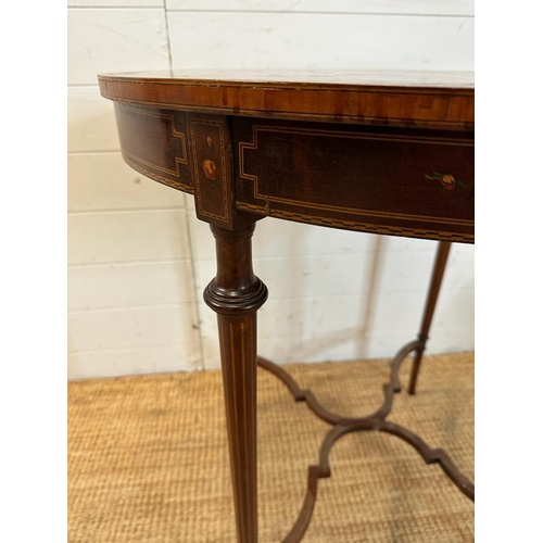 91 - An Edwardian mahogany and painted centre table. Height 75 diameter 69