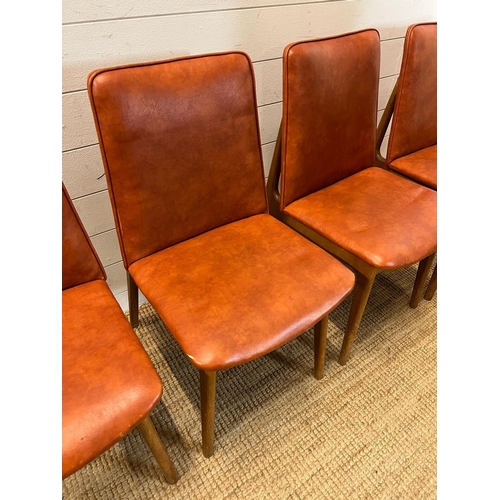 96 - Four vinyl and teak chairs in the style of Adrian Pearsall