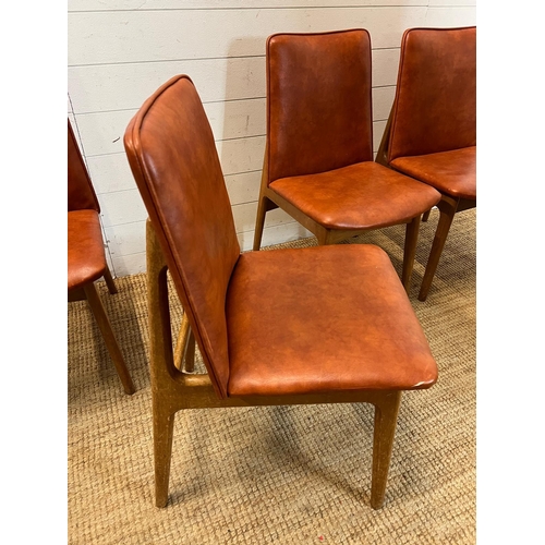 96 - Four vinyl and teak chairs in the style of Adrian Pearsall