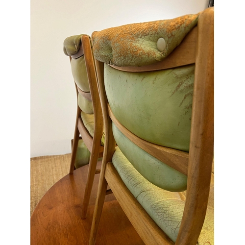 101 - A Mid Century teak circular extending table with four balloon back chairs (H73cm W120cm)