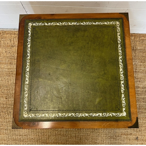 105 - A campaign style side table with green leather top and drawer (H48cm Sq60cm)