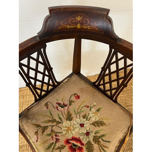 116 - An inlaid mahogany corner chair