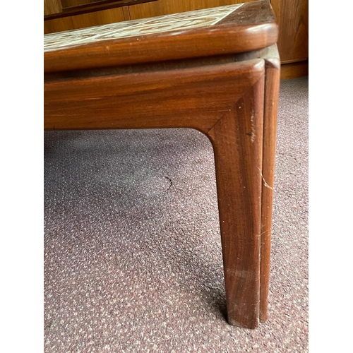 124 - A Mid Century coffee table with tiled top (H46cm W134cm D74cm)