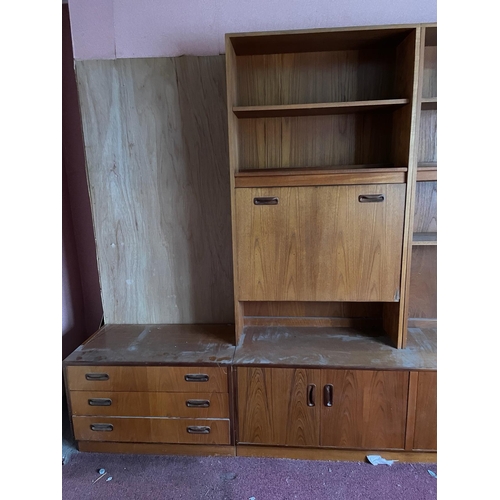 126 - A Mid Century G-Plan wall unit comprising of four units, a four drawer base unit (H54cm W81cm D48cm)... 