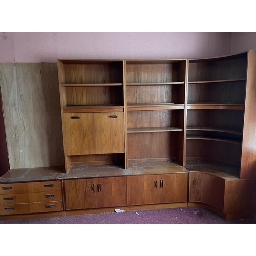 126 - A Mid Century G-Plan wall unit comprising of four units, a four drawer base unit (H54cm W81cm D48cm)... 