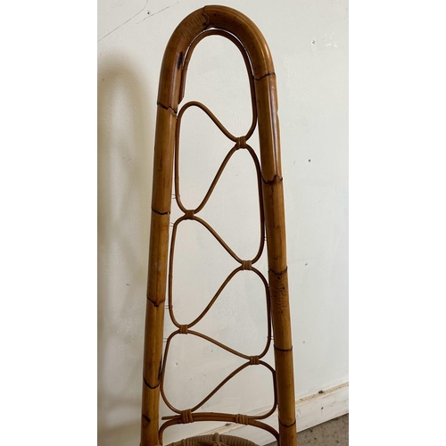 146 - A Mid Century bamboo low chair with curved high back