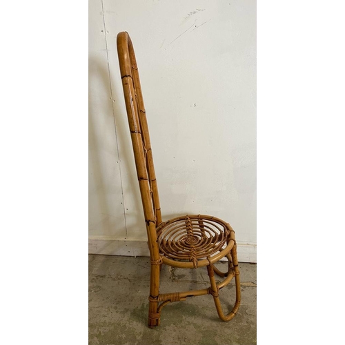 146 - A Mid Century bamboo low chair with curved high back