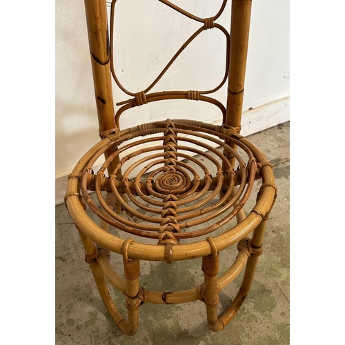 146 - A Mid Century bamboo low chair with curved high back