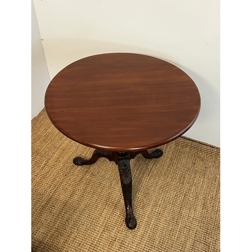 150 - A circular pedestal table on tripod legs (H71cm Dia75cm)