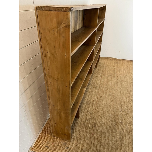 155 - A large pine open bookcase (one piece) H141cm W240cm D24cm