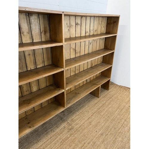 155 - A large pine open bookcase (one piece) H141cm W240cm D24cm