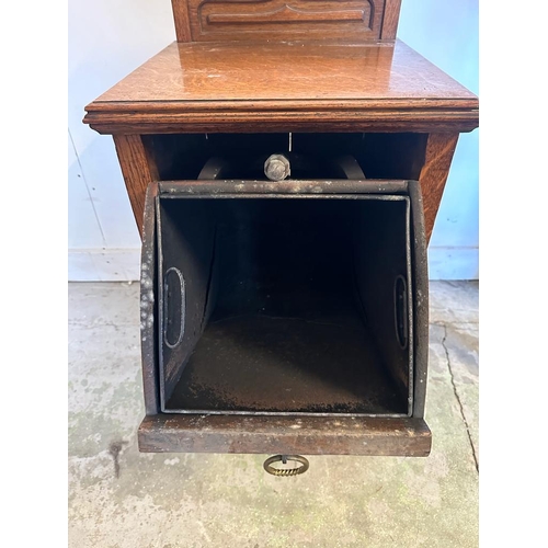 165A - A vintage oak coal box with carved front tree detail and galleried top (H83cm W44cm D41cm)