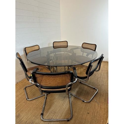 168 - A 1970's Richard Young for Merrow Associates chrome and glass topped circular dining table along wit... 