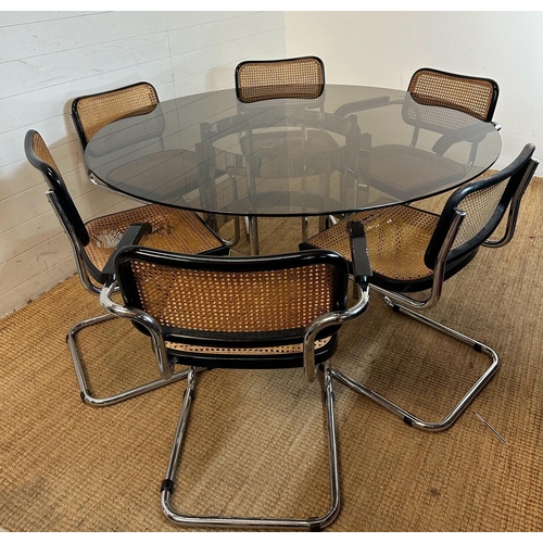 168 - A 1970's Richard Young for Merrow Associates chrome and glass topped circular dining table along wit... 