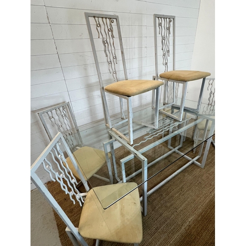 170 - A large glass and metal framed table with six high back chairs (H74cm W180cm D90cm)