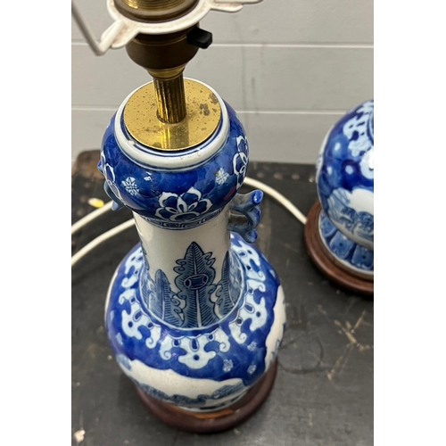 181 - A pair of blue and white porcelain table lamps