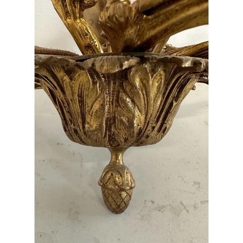 186 - A French five branch gilt chandelier with central cherub detail