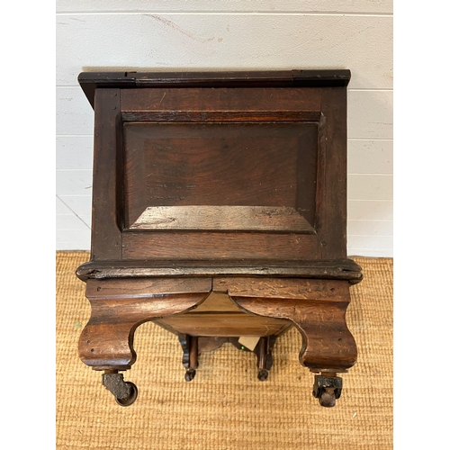 19 - An oak two panelled coffer (H45cm W90cm D40cm)