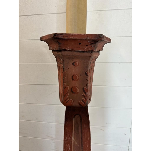 190 - A wooden floor standing prop lamp with tapering base