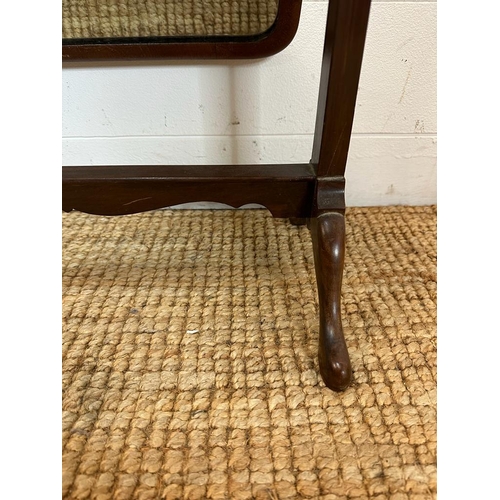 204 - A Edwardian mahogany framed toilet mirror on splayed feet