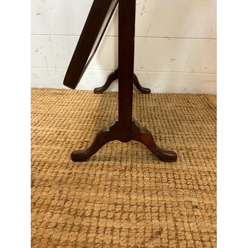 204 - A Edwardian mahogany framed toilet mirror on splayed feet