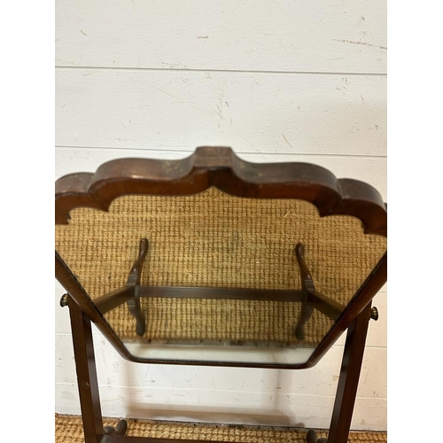 204 - A Edwardian mahogany framed toilet mirror on splayed feet