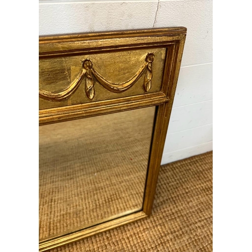 205 - A regency style gilt over mantle mirror with swag detail