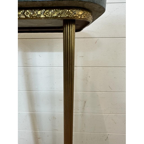 21 - A green marble topped plant stand on brass fluted column supports on brass lions paw feet (H91cm)