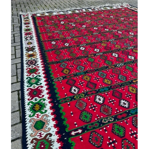 216 - A Kilim carpet, hand woven wool rug, cleaned and demanded