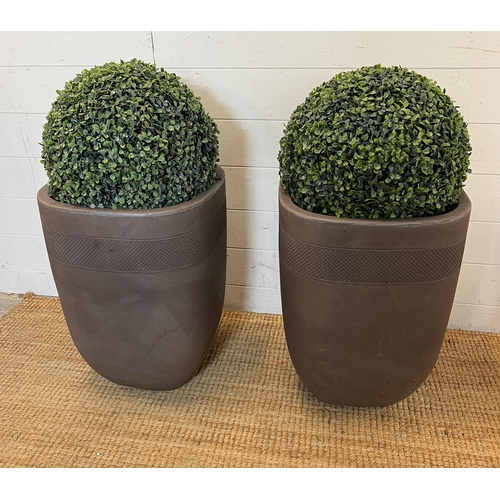 231 - A pair of faux garden box hedge topiary balls in planters (H78cm)