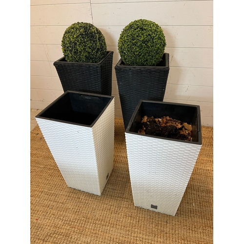 232 - Four rattan planters, two black (H60cm) and two white (H50cm)