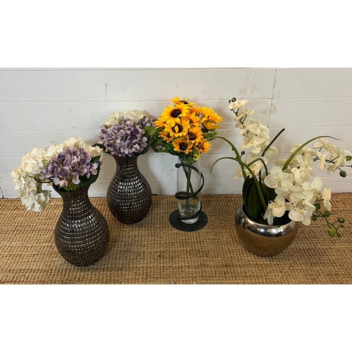 236 - Four faux flowers in contemporary vases