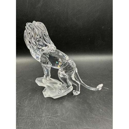 246 - A boxed Swarovski crystal lion