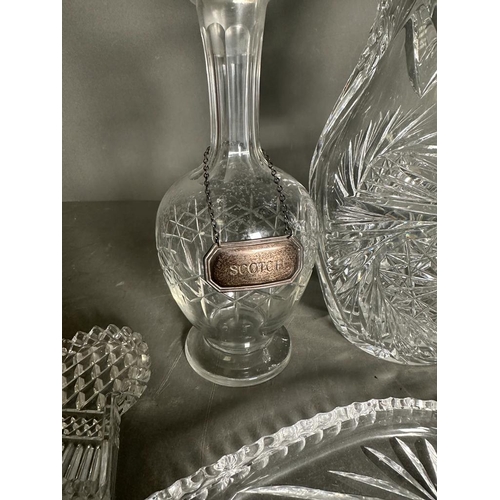 247 - A selection of cut glass items to include two decanters with silver hallmarked tags