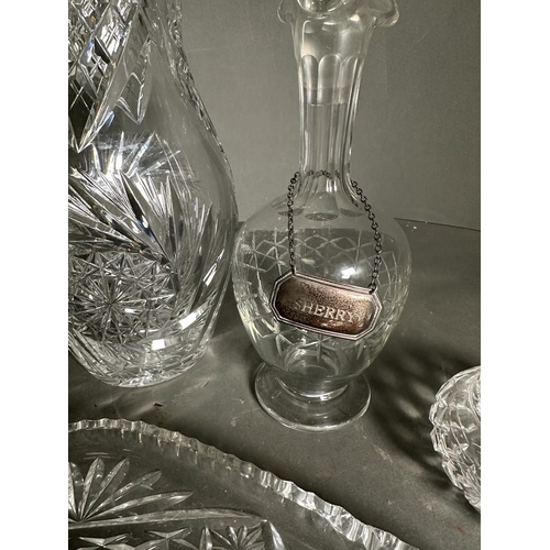 247 - A selection of cut glass items to include two decanters with silver hallmarked tags