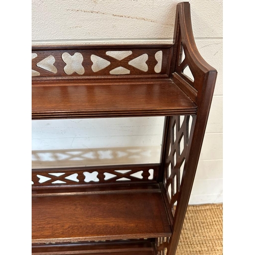 26 - A mahogany three shelf wall hanging bookcase with piece sides and back rail.