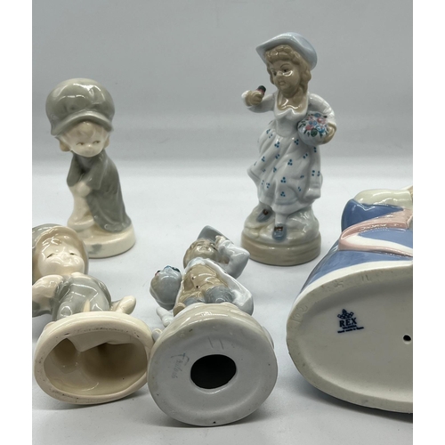 266 - A selection of porcelain figures