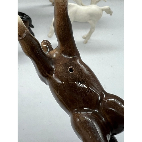 273 - Four Beswick china horses and one alabaster unicorn