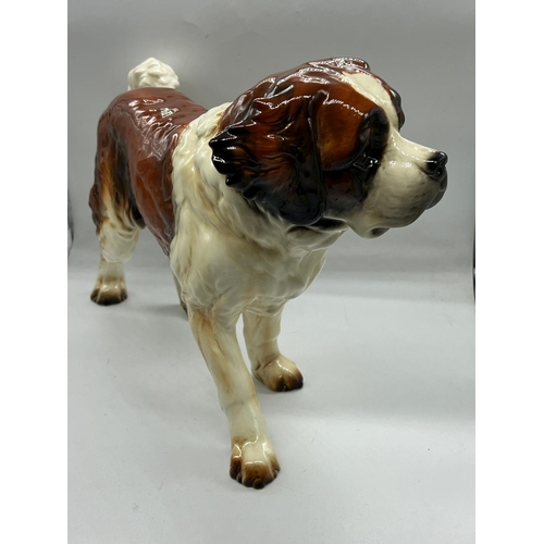 275 - A large Goebel St Bernard dog figurine model (H29cm W47cm)