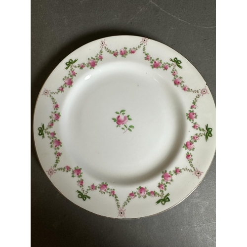 277 - A part Crown Staffordshire pink rose tea service to include side plates, cups and saucers and a teap... 