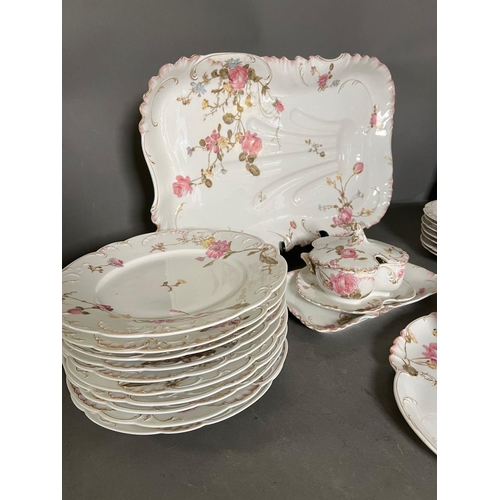 278 - A Bennett Brothers china dinner service comprising of plates, meat plates, lidded pots etc (Platter ... 