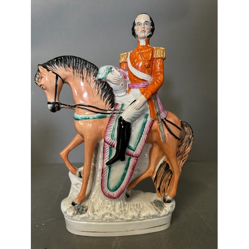 290 - Two Staffordshire flat backs, one of Garibaldi and the other of a general on horseback