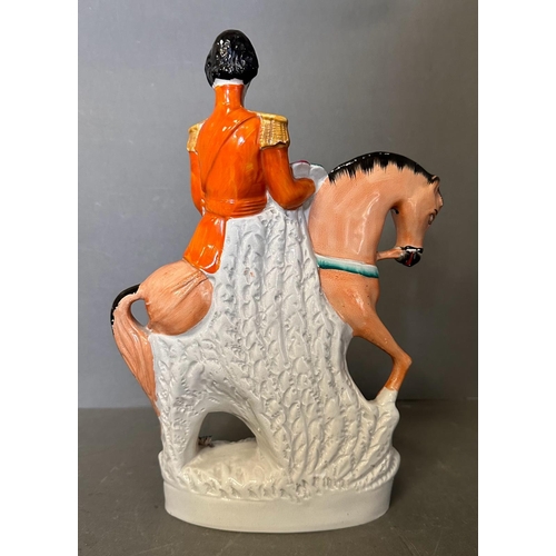 290 - Two Staffordshire flat backs, one of Garibaldi and the other of a general on horseback