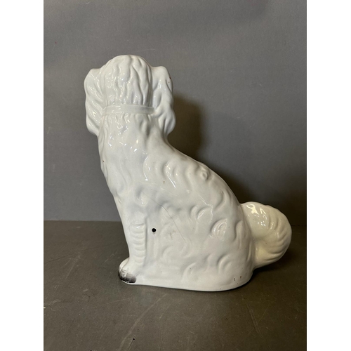 291 - A large 19th Century Staffordshire spaniel in white and gold