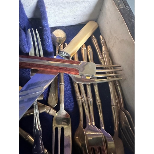 295 - A box of mixed flatware various styles