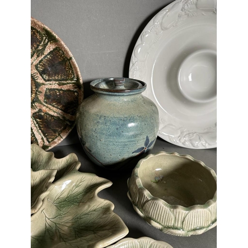 297 - A selection of mixed ceramics to include lidded jars, dishes and serving plates