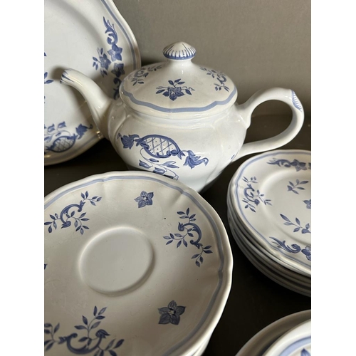 298 - A blue and white tea service by Longchamp of France to include teapot, cups and saucers etc